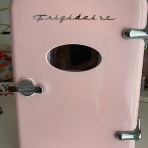 Pink mini refrigerator